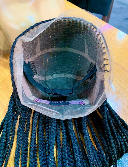 Perruque tressée passe mèche tous derrière