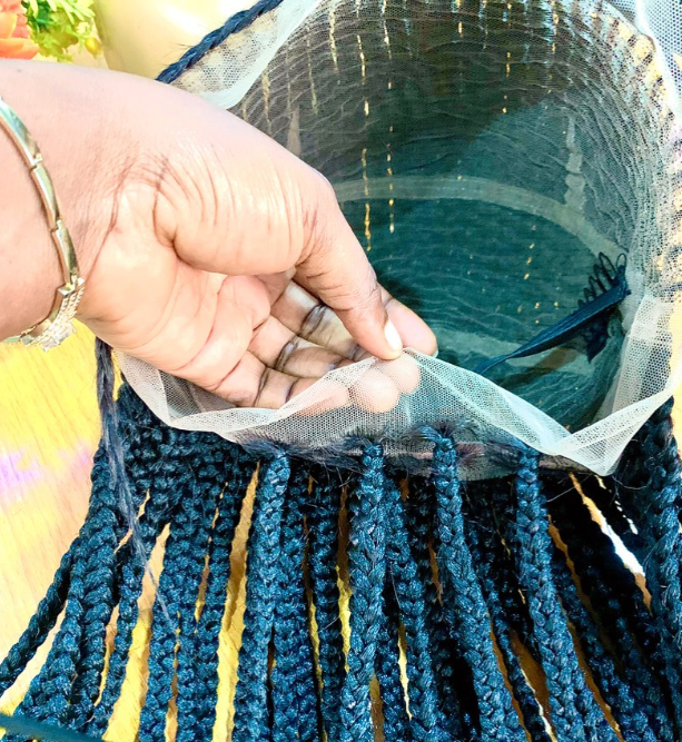 Perruque tressée passe mèche tous derrière